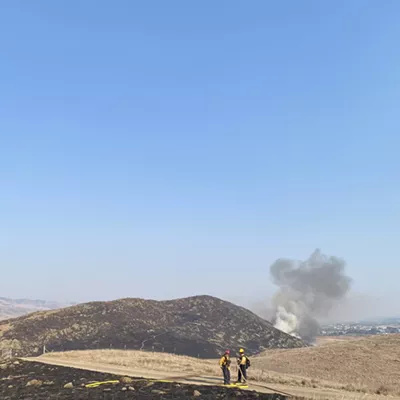 Image: Crews prevent open space fire from reaching SLO homes