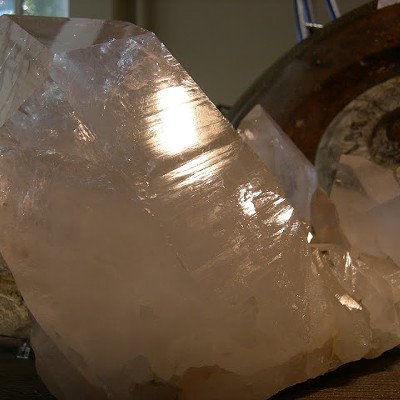 Quartz crystal with fossilized Ammonite.
