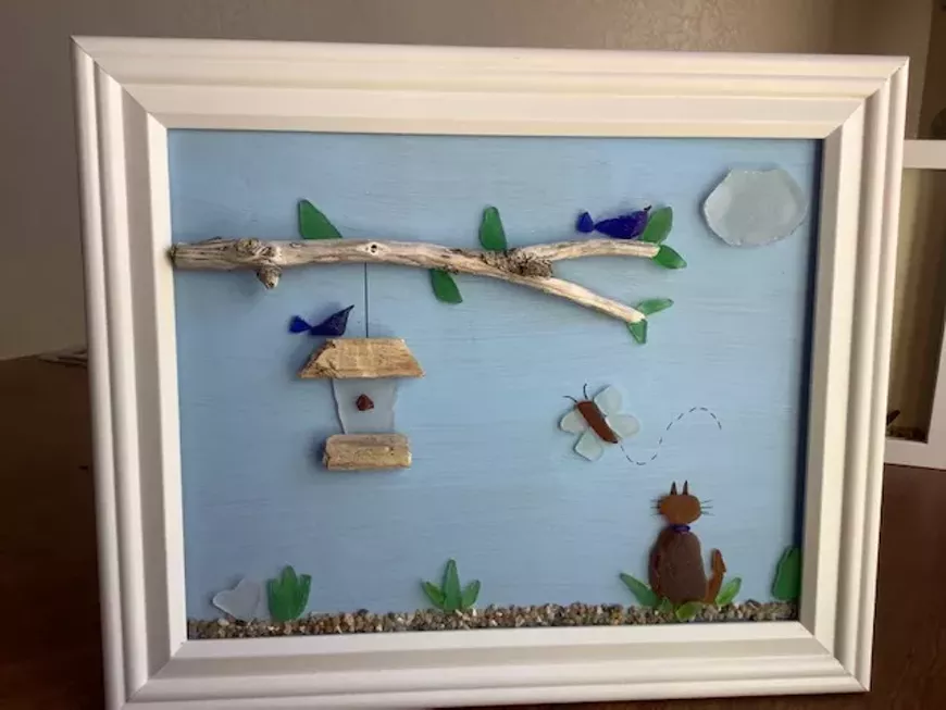 Create with sea glass and driftwood.