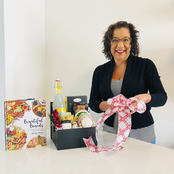 TRULY GIFTED Nipomo resident Marina Garcia-Endert puts together customized gift baskets, boxes, and packages that often include Central Coast goods. - PHOTO COURTESY OF MARINA GARCIA-ENDERT