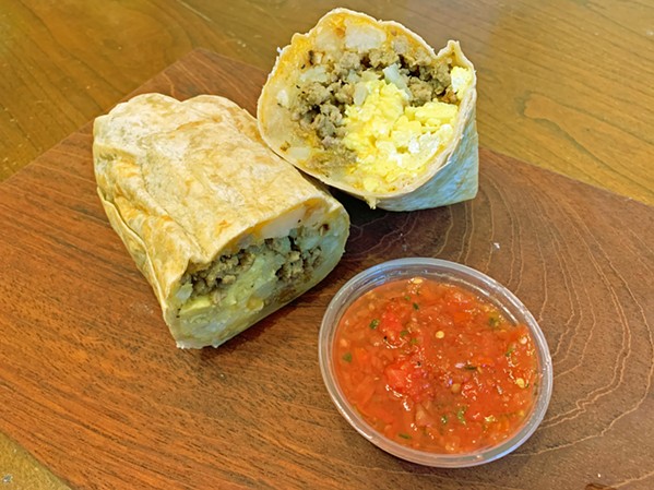BREAKFAST IS SERVED Jaime's 1-pound breakfast burrito comes with homemade salsa, and it doesn't disappoint with potatoes, eggs, cheese, and a choice of chorizo, sausage, bacon, or veggie. - PHOTOS BY CAMILLIA LANHAM