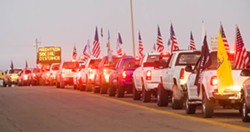 READY TO RIDE Trucks line up outside the entry to the Oceano Dunes SVRA on Oct. 30, 2020, the first day in seven months that vehicles were allowed in the park. - FILE PHOTO BY JAYSON MELLOM