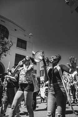 MARCH FOR JUSTICE Protesters poured into the streets of San Luis Obispo to protest the death of George Floyd while in police custody, part of a nationwide protest against police brutality of Black people. - COURTESY PHOTO BY RICHARD FUSILLO