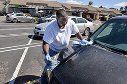 RETURN TO MOBILE A new ordinance passed by Santa Maria City Council aims to make mobile car washers truly mobile by banning washing on public property. - FILE PHOTO BY CAMILLIA LANHAM