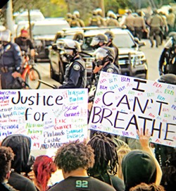 TOUGH YEAR The SLO Police Department will discuss its 2020 crime report, including its response to protests (pictured), on May 4. - FILE PHOTO BY PETER JOHNSON