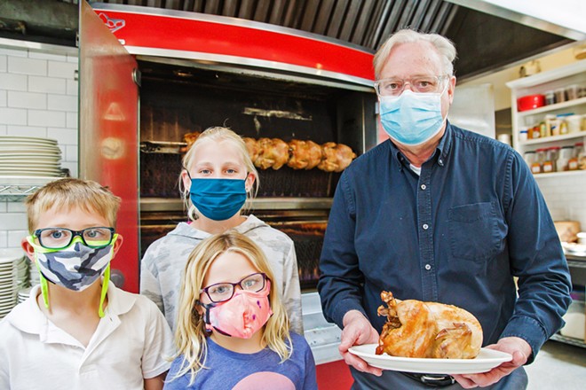 Tasty To-Go SLO Provisions owner Steve Bland and his grandkids show off rotisserie chicken&mdash;a lemon and herb-brined Mary's free range chicken slow cooked in the French rotisserie&mdash;one of many delicious items on the Best Takeout Menu around. - PHOTO BY JAYSON MELLOM