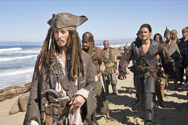 THE WORLD'S END Johnny Depp and Orlando Bloom appear in The Pirates of the Caribbean: At World's End (2007), partly filmed at the Guadalupe-Nipomo Dunes. - COURTESY PHOTO BY STEPHEN VAUGHN FROM DISNEY ENTERPRISES INC.