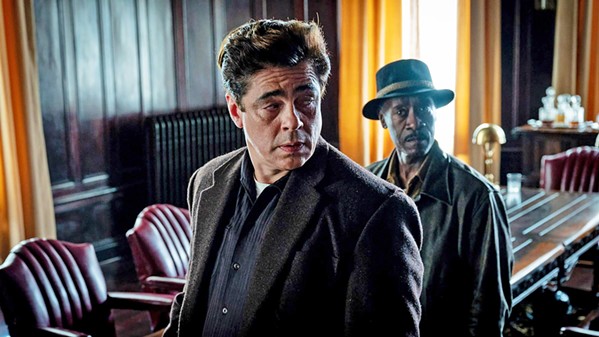 TRUST ISSUES Career criminals Ronald Russo (Benicio Del Toro, left) and Curt Goynes (Don Cheadle) are teamed to pull off a heist in No Sudden Move. - PHOTO COURTESY OF HBO MAX AND WARNER BROS.