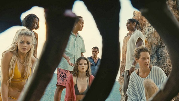 GOING ... GONE Various vacationers at a tropical resort discover their lives have sped up on a secluded beach, aging years every hour, in auteur M. Night Shyamalan's Old, playing in local theaters. - PHOTO COURTESY OF UNIVERSAL PICTURES