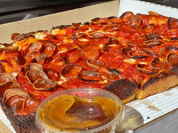 PEPPERONI PLEASER A side of serrano- and habanero-infused hot honey at Benny's Pizza runs $2 for a 3-ounce ramekin. "Although I would love to give it away, honey is expensive AF," the eatery recently posted on Facebook. "Trust me, you'll love it." - PHOTO COURTESY OF BENNY'S PIZZA