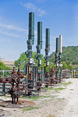 NEW WELLS COMING? After six years in limbo, San Luis Obispo County gave Sentinel Peak Resources the green light to drill 31 new wells at the Arroyo Grande Oilfield (pictured)&mdash;drawing criticism from residents and activists. - FILE PHOTO BY JAYSON MELLOM