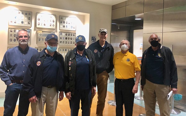 AT LONG LAST After a five-year wait, members of the Cayucos Lions Club (pictured) celebrated reaching the $5.4 million financial goal to rehabilitate the town's closed Vets Hall. - PHOTO BY BULBUL RAJAGOPAL