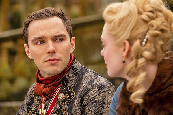 BEHIND EVERY GREAT MAN Peter III (Nicholas Hoult), Russia's depraved and short-lived ruler, is being plotted against by his progressive wife, Catherine (Elle Fanning), who's destined to become Catherine the Great, the longest-reigning female ruler in Russian history, in the Hulu TV series The Great. - PHOTO COURTESY OF THRULINE ENTERTAINMENT