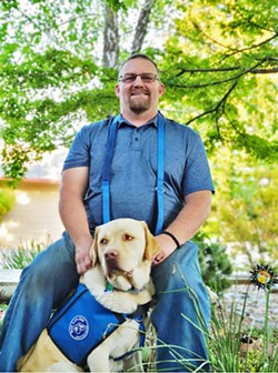 SERVICE READY Veteran David Petersen found the ability to pursue a career as a high school sports coach in Oroville with the help of his New Life K9s service dog, Cole. - PHOTO COURTESY OF DAVID PETERSEN