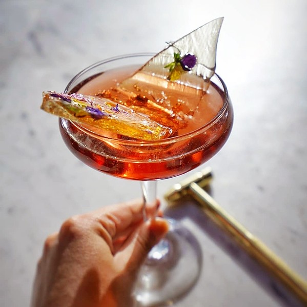 BREAKING BARRIERS Crafted by Root Elixirs Founder Dominique Gonzales, the Granada Hotel &amp; Bistro's Glass Ceiling Cocktail is one of dozens of specials available throughout the county for Women's Restaurant Week. Tiny hammers to "break the glass ceiling" are included! - PHOTO COURTESY OF AT HER TABLE