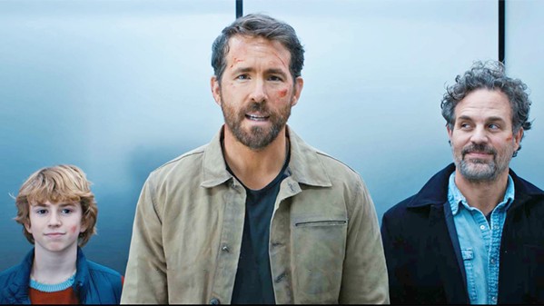 IT'S A FAMILY AFFAIR In Netflix's new sci-fi thriller, a time traveler (Ryan Reynolds, center) goes back in time and meets his younger self (Walker Scobell, left) and his long dead father Louis (Mark Ruffalo), in a bid to save the future world. - PHOTO COURTESY OF 21 LAPS ENTERTAINMENT