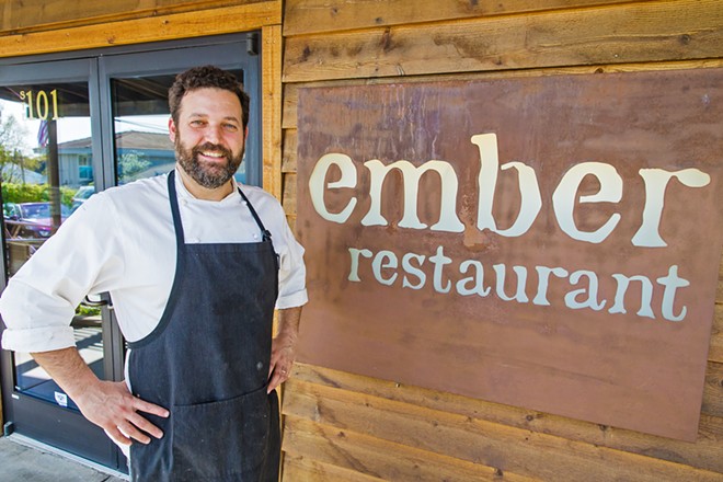 LESS IS MORE Best Chef Brian Collins helms the wood-fired kitchen of the Best South County Restaurant, Ember in Arroyo Grande. Ember's specialty is hand-crafted "Italian-inspired California cuisine" cooked in its wood-burning oven, which indoor diners can see in the open kitchen. Collins, an Arroyo Grande native, noted on the restaurant's website that cooking Italian means: "No. 1, cooking with a genuine spirit of giving and love; No. 2, cooking what is local and with a proud sense of tradition; No. 3, less is more!" - PHOTO BY JAYSON MELLOM