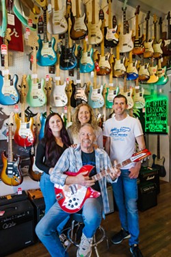 HEAVEN ON EARTH The crew at Lightning Joe's Guitar Heaven in Arroyo Grande&mdash;(left to right) Savanna Macias, Marelene Daoust, and Joseph Daoust; Lightning Joe himself is seated&mdash;offer stellar service and expertise at the Best Place to Buy a Musical Instrument. For 38 years, Lightning Joe's has been selling used, vintage, and new guitars and other fretted instruments. The family-owned and operated store also has a repair shop, hosts private lessons, and sells gear and accessories. - PHOTO BY JAYSON MELLOM