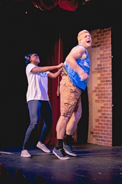 PAYBACK IS A ... Penelope (Gabrielle Smith) gives Dax (Hank Fisher) a particularly theatrical wedgie in the Melodrama's updated version of its original 2014 play, The Mark of Morro. - PHOTOS COURTESY OF THE MELODRAMA