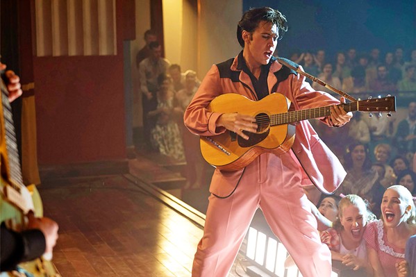 RAW SEXUALITY Austin Butler takes on the role of Elvis Presley, in auteur Baz Luhrmann's spectacular musical biopic, Elvis, playing in local theaters. - PHOTO COURTESY OF WARNER BROS., BAZMARK FILMS, AND ROADSHOW ENTERTAINMENT