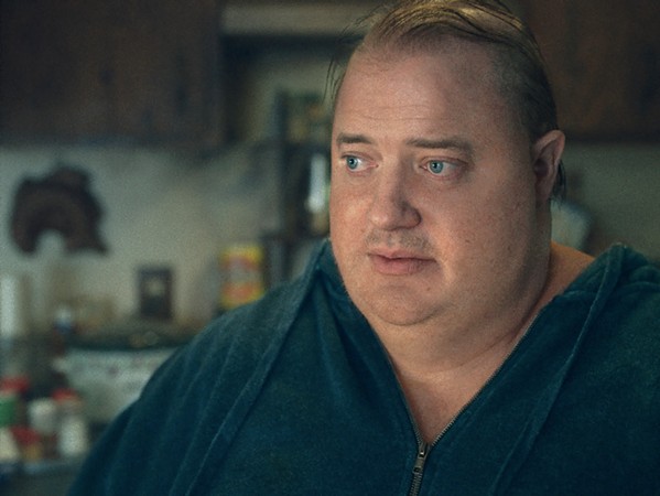 EATEN UP WITH GUILT Charlie (Brendan Fraser under a prosthetic fat suit) weighs 600 pounds, never wants to leave his apartment, and is eating himself to death out of sadness and regret, but before he goes, he wants to reunite with his estranged teenage daughter, in The Whale. - PHOTO COURTESY OF A24 AND PROTOZOA PICTURES