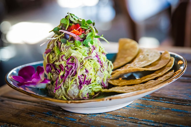 HAPPY-TIZER Grab an ahi crudo&mdash;sushi grade ahi, avocado, shaved cabbage, cilantro crema, and a lime vinaigrette with crisp corn tostadas&mdash;to start your meal off right at the Best North County Restaurant, Fish Gaucho in Paso Robles. - PHOTO BY JAYSON MELLOM
