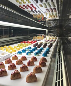 BEAUTIFUL BONBONS Chef Florencia Breda's signature chocolates are handmade daily, with new flavor combinations hitting her display case at Mistura regularly. She uses premium Valrhona chocolate, including vegan options. - PHOTO COURTESY OF BREDA SLO
