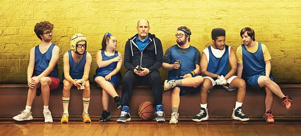 WINNERS (Left to right) Arthur (Alex Hintz), Marlon (Casey Metcalfe), Cosentino (Madison Tevlin), Coach Marcus (Woody Harrelson), Johnny (Kevin Iannucci), Darius (Joshua Felder), and Craig (Matthew Von Der Ahe) star in Champions, on Peacock and at Redbox. - PHOTO COURTESY OF UNIVERSAL PICTURES UK