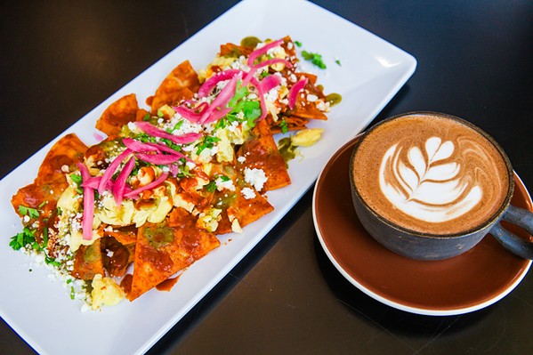 DELECTABLE DUO The chilaquiles with scrambled egg and pickled red onions are a customer favorite, according to Lopez. Pair it with a spicy latte called the La Frida Sufrida that contains chocolate straight from Chiapas, Mexico. - PHOTOS BY JAYSON MELLOM