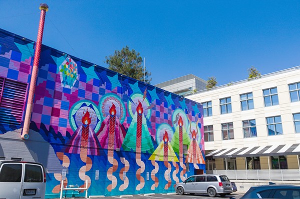 STUPENDOUS SISTERS Maria Molteni's Seven Sisters (Celestial Subduction) serves as the introduction SLOMA Executive Director Leann Standish gives visitors to public art in San Luis Obispo. - PHOTO BY JAYSON MELLOM