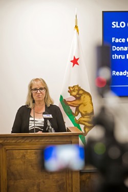 RECHARGED CONTROVERSY San Luis Obispo County Public Health Director Penny Borenstein, pictured here in 2020, said on Oct. 17, the new vaccine and face mask mandate for health care works is no different from the county's 12-year-old influenza mandate. - FILE PHOTO BY JAYSON MELLOM