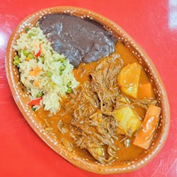 BEEFED UP The product of both Guatemalan and Chiapan cooking, Azteca Market's hilachas is a warming shredded beef stew with potatoes and carrots that comes with Mexican rice and refried black beans - PHOTO COURTESY OF AZTECA MARKET