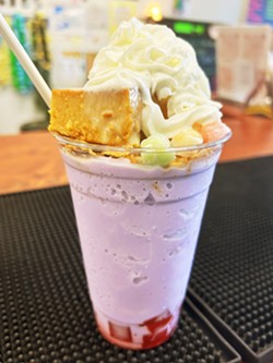 FUSION DRINK The Mahalo Halo is a twist on the Filipino dessert halo-halo that's made with a purple ube-taro mix, Frosted Flakes, mochi balls, and leche flan. - PHOTOS COURTESY OF PCH SHAVE ICE AND BOBA