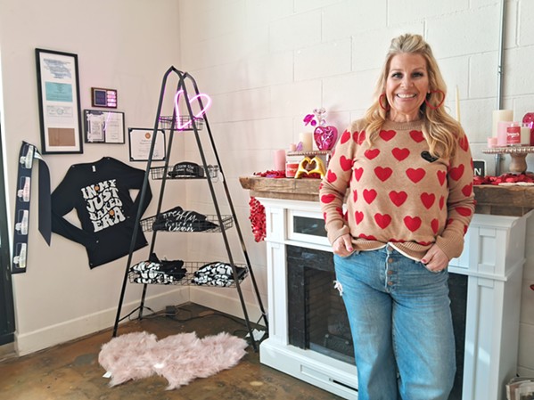 SWEET COMMITMENT Just Baked owner Libby Ryan goes all out for every holiday and matches the bakery's Valentine's Day-themed interiors with her own heart-centric fashion. - PHOTO BY BULBUL RAJAGOPAL