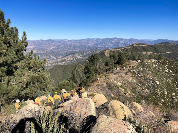 Rangers hike on La Cumbre Peak, north of the city of Santa Barbara, to conduct vegetation removal. - PHOTO COURTESY OF LOS PADRES FOREST SERVICE
