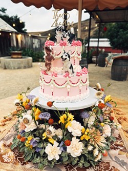 TAILORED FOR YOU Amy Marks of the Cakery designed this vintage-style cake for a couple who rescues dogs and also wanted a Wes Anderson-inspired cake that referenced the Grand Budapest Hotel. - COURTESY PHOTO BY THE CAKERY