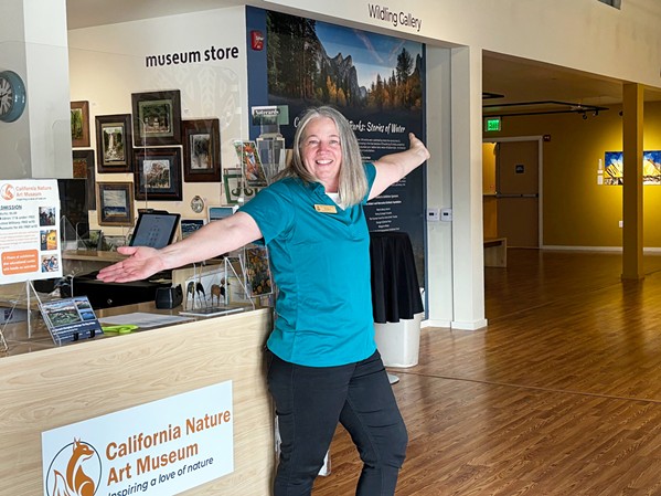 WARM WELCOME Guests of the California Nature Art Museum (or Cal-NAM for short, formerly the Wildling Museum of Nature and Art) in downtown Solvang are often greeted by the venue's store and visitor services manager, Sheila Francis. - COURTESY PHOTO BY JONI KELLY
