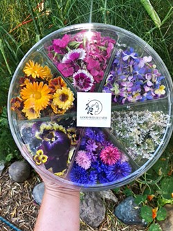 FLOWER WHEEL Good Witch Farm grows a plethora of edible flowers like pansies, violas, hollyhocks, calendula, borage, yarrow, carnations, and dianthus. - PHOTOS COURTESY OF JANE DARRAH