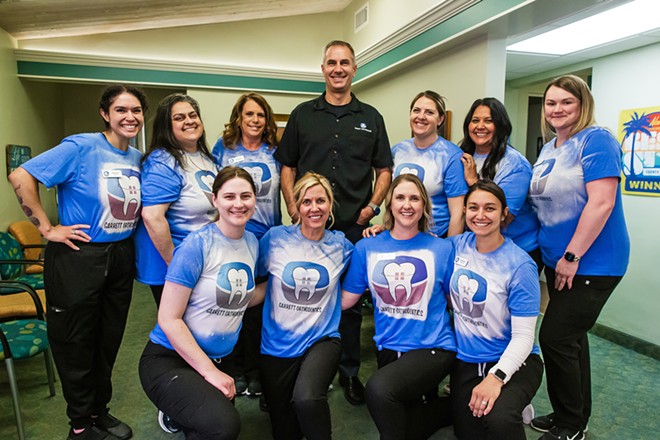 STELLAR SMILES Dr. Brett Garrett and "The GO Team" of Garrett Orthodontics, the Best Orthodontist's Office, with locations in SLO and Arroyo Grande, take the time to ensure their patients&mdash;children, teens, and adults&mdash;understand the process of building the best foundation for perfect pearly whites. They value creating enduring relationships, according to their website, because "maintaining your smile is a lifelong commitment." - PHOTO BY JAYSON MELLOM