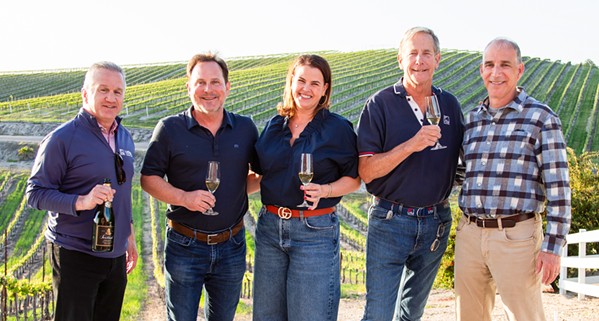 MEANT TO BE From left to right, Eric Krasnoo of U.S. Sailing, and Sextant Wines proprietors Craig and Nancy Stoller celebrate their official union with the sporting governing body leaders Rich Jepsen and Alan Ostfield. - PHOTO COURTESY OF SEXTANT WINES