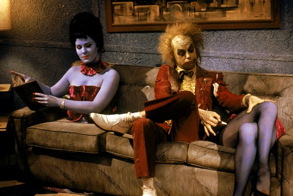 FREAK THE DEETZ! A "bio-exorcist" called Betelgeuse (Michael Keaton) is hired by two ghosts to scare off the Deetz family who moved into the ghosts' old house, in Beetlejuice, available on Max. - PHOTO COURTESY OF WARNER BROS. HOME ENTERTAINMENT