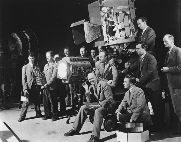 OLD-SCHOOL Michael Powell, Emeric Pressburger, and their crew appear in this archival photo, one of many archival elements displayed in the documentary Made in England: The Films of Powell and Pressburger, screening at the Palm Theatre of San Luis Obispo. - PHOTO COURTESY OF THE COHEN MEDIA GROUP