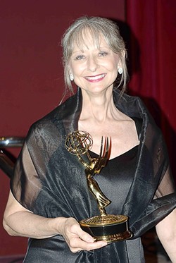 ACTOR EXTRAORDINAIRE :  Rae Stone&mdash;an actor, teacher, and supporter of theater on the Central Coast&mdash;died of cancer Friday, Aug. 24, while staying with her mother in Florida. Locals, however, are only recently learning of her passing. Pictured is Stone in 2006 with the Emmy she won for her on-air work on a PSA. - PHOTO BY SHAMA RAJ