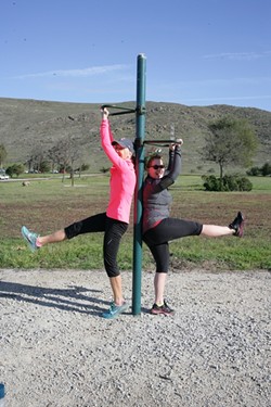 LEGS LIFTS?:  UGH! Kristen Meisenheimer (left) and Anna Starkey feel the burn. - PHOTO BY GLEN STARKEY