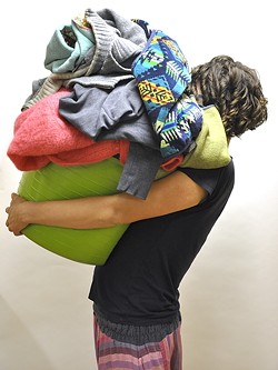 PILE-UP! :  Doing laundry is a drag. Get it done, and do it well by following this guide. - PHOTO BY CAMILLIA LANHAM