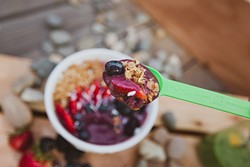 DEEP PURPLE:  Spoon-n-Bowls food truck is serving up healthy, vibrant a&ccedil;a&iacute; bowls topped with fresh, locally sourced toppings. - PHOTO BY KAORI FUNAHASHI