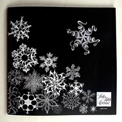 SNOWFLAKES :  A Saks Fifth Avenue ad featuring snowflakes was designed by Marian Bantjes. - IMAGE BY MARIAN BANTJES