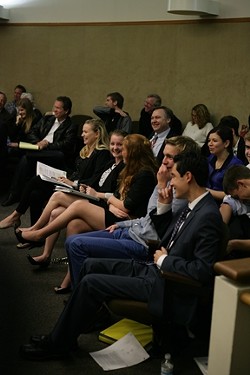 MOMENT OF LEVITY! :  Students from Mission Prep crack up during an exchange during the trial.