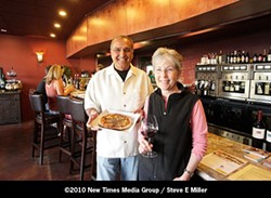 TIMES TWO :  Ash Mehta, in partnership his wife Lissa Hallberg, have reproduced in Pismo Beach the very successful wine bar they own in Solvang - PHOTO BY STEVE E. MILLER