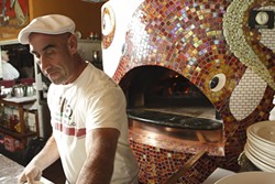 OCTOPUS MAN :  Giuseppe DiFronzo&rsquo;s boundless creativity extends to the new oven he designed to prepare his exquisite Italian fare. - PHOTO BY STEVE E. MILLER